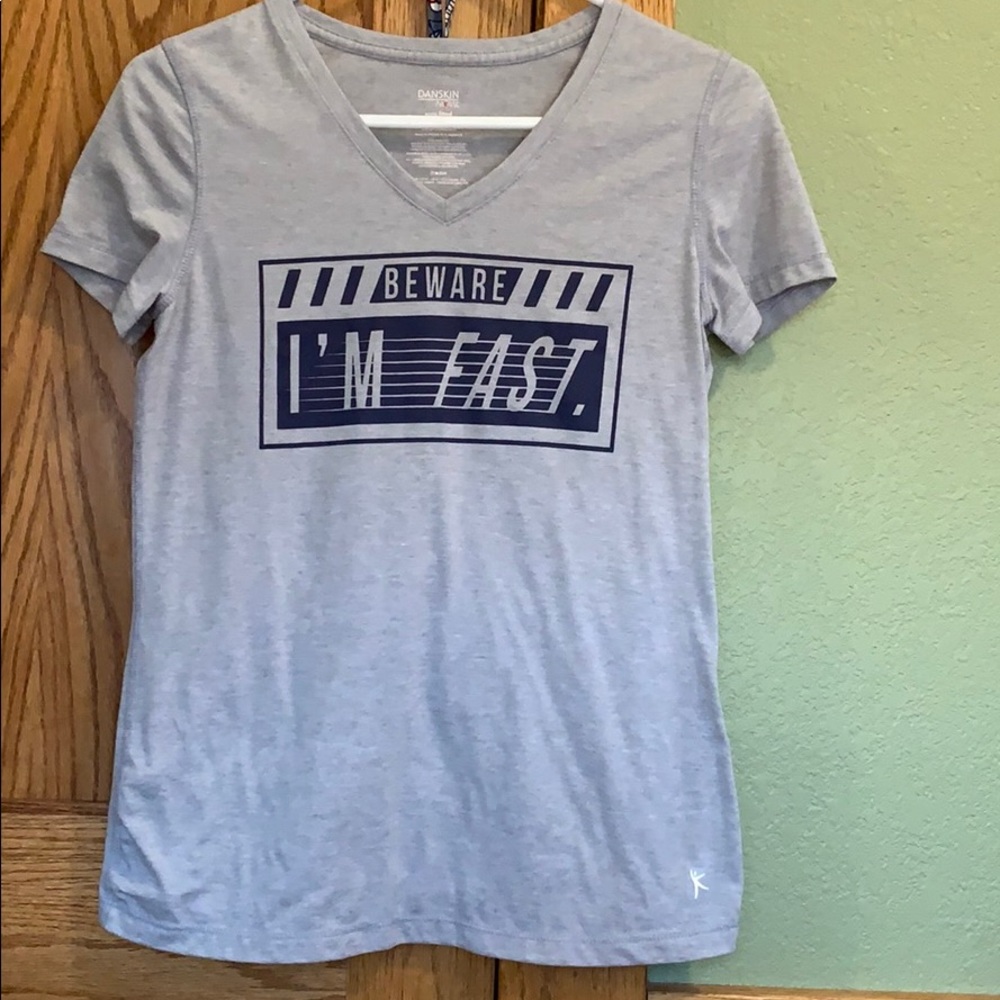 Silver tee shirt.